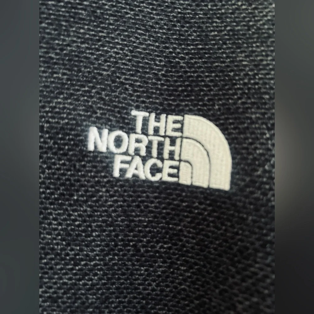 The North Face Men's black Zip-Up Sweater